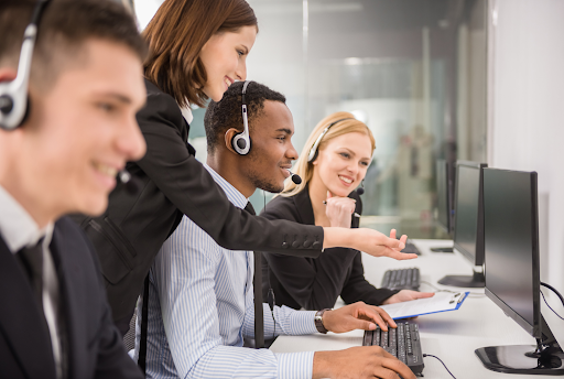 Contact center agents conversing. 